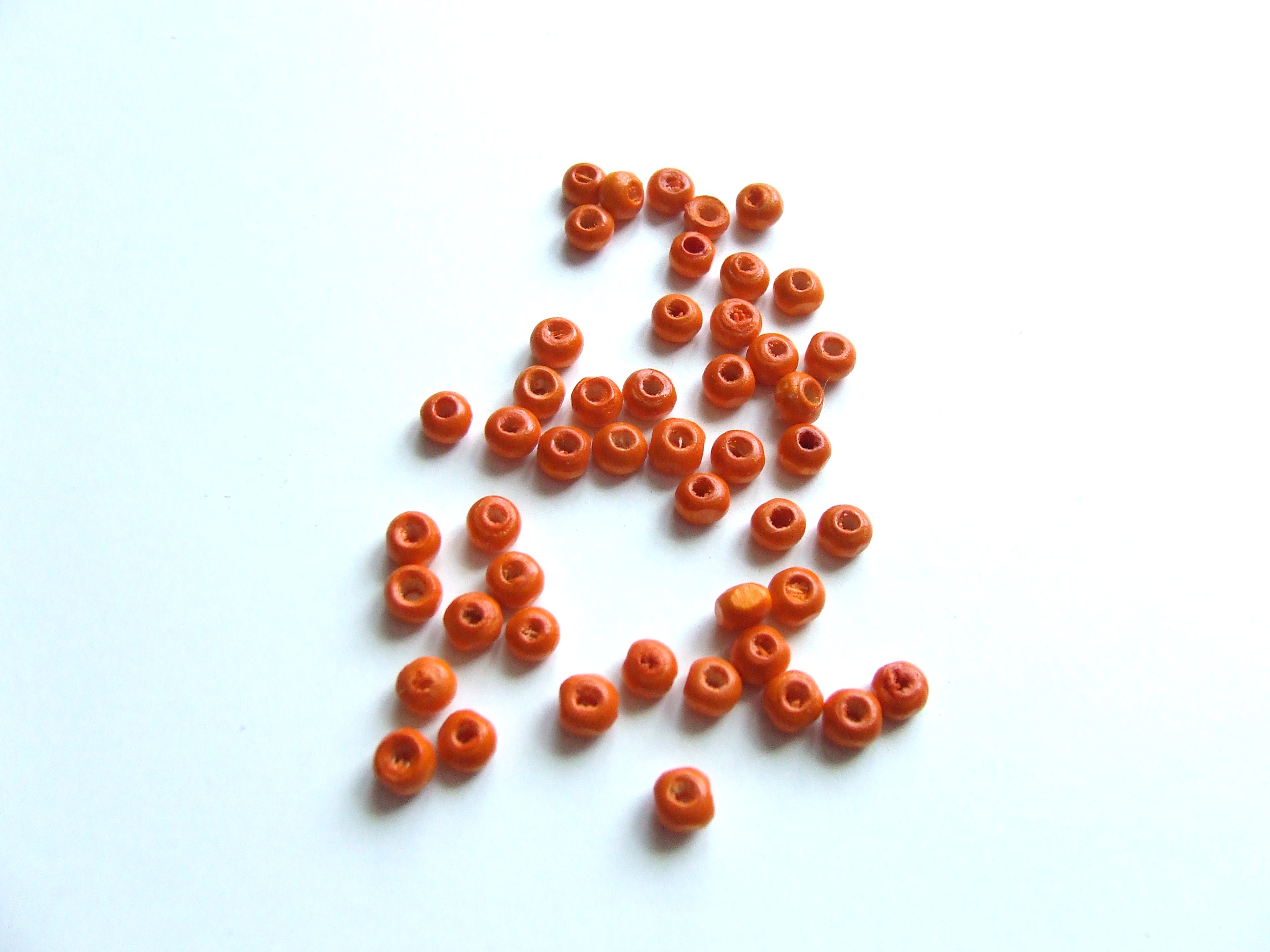 R1129 Lot 20 perles intercalaire ovale de couleur orange 4x3mm 